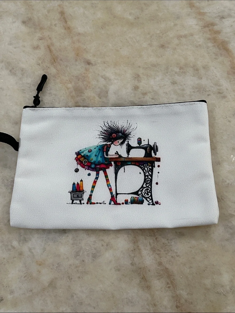White Printed Wristlet Pouch with Colorful Sewing Illustration